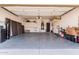 The garage features an epoxy floor, overhead storage, water softener, and is well-lit at 4791 S White Pl, Chandler, AZ 85249