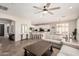 Open-concept living room with tile floors and natural light at 4791 S White Pl, Chandler, AZ 85249