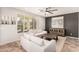 Comfortable living room with plush seating and a stylish accent wall at 4791 S White Pl, Chandler, AZ 85249