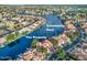 Aerial view of the lakeside community and the property with a community pool at 517 S Marina Dr, Gilbert, AZ 85233