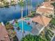 Lakefront property with large community pool, pergola and lounging area at 517 S Marina Dr, Gilbert, AZ 85233