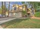 Inviting two-story home with a well-maintained front yard and a two-car garage at 517 S Marina Dr, Gilbert, AZ 85233
