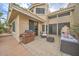 Spacious rear patio with seating, grill, and outdoor cooking perfect for entertaining at 517 S Marina Dr, Gilbert, AZ 85233