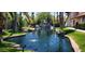 Beautiful water feature with mature landscaping and a relaxing atmosphere at 517 S Marina Dr, Gilbert, AZ 85233