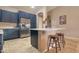 Gourmet kitchen with stainless steel appliances, granite countertops, and lots of cabinet space, perfect for cooking at 522 S 122Nd Ln, Avondale, AZ 85323