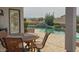 Back patio has desert landscaping and a nice pool with a view of the mountains at 522 S 122Nd Ln, Avondale, AZ 85323