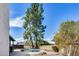 Backyard features a sparkling pool, mature trees, and an orange tree providing a serene outdoor space at 5532 W Onyx Ave, Glendale, AZ 85302