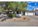 Charming single-story home featuring a well-maintained front yard and a two-car garage at 5532 W Onyx Ave, Glendale, AZ 85302