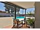 Lush backyard with a sparkling pool, lounge chairs, and a covered patio area at 6071 E Ludlow Dr, Scottsdale, AZ 85254