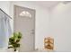 Bright bathroom featuring a shower, a door, and a small corner shelf at 6071 E Ludlow Dr, Scottsdale, AZ 85254