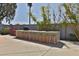 Outdoor bar featuring decorative tiling and seating for ten, perfect for entertaining guests at 6071 E Ludlow Dr, Scottsdale, AZ 85254