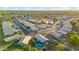 Extensive aerial shot showcasing a residential area with diverse homes and community streets at 644 W Dublin St, Gilbert, AZ 85233