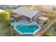 An expansive aerial view of a backyard with a pool and patios for outdoor enjoyment at 644 W Dublin St, Gilbert, AZ 85233