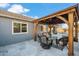 Outdoor gazebo features a seating area with cushioned chairs and a view of the home at 644 W Dublin St, Gilbert, AZ 85233