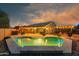 Expansive backyard featuring a beautiful pool, complete with a covered outdoor kitchen at 644 W Dublin St, Gilbert, AZ 85233
