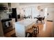 Contemporary eat-in kitchen with stainless appliances and quartz countertops at 7023 E 4Th St # 104, Scottsdale, AZ 85251