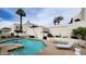 Community pool with clear water and inviting lounge area at 7023 E 4Th St # 104, Scottsdale, AZ 85251