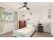 This bedroom offers natural light, a ceiling fan, and neutral decor, with ample space at 807 E Harvard Ave, Gilbert, AZ 85234