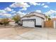 Charming home with a well-manicured yard and an attached two-car garage, perfect for suburban living at 807 E Harvard Ave, Gilbert, AZ 85234