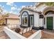 Charming home with a cozy patio area and a unique arched window, perfect for relaxation at 807 E Harvard Ave, Gilbert, AZ 85234