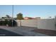 View of the gated entrance with security features and a concrete driveway, ensuring privacy and controlled access at 8749 E Via De Sereno --, Scottsdale, AZ 85258