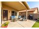 Relaxing covered patio with comfortable seating, perfect for enjoying the outdoors at 9853 W Tonopah Dr, Peoria, AZ 85382