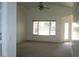 Living room featuring large windows that let in natural light at 11206 W Granada Rd, Avondale, AZ 85392