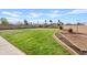 This large backyard has plenty of room to play or entertain with block wall for privacy at 11405 E Rafael Ave, Mesa, AZ 85212