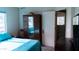 Bright bedroom featuring a bed, wardrobe and doorway to an additional room at 1213 N Raven --, Mesa, AZ 85207