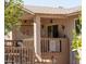 View of covered patio featuring lattice design, ceiling fan, furniture, and slider door access to home at 1213 N Raven --, Mesa, AZ 85207