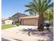 Charming two-story home with an attached garage and well-maintained landscaping at 1213 N Raven --, Mesa, AZ 85207