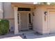 Inviting front entrance with security door, covered porch, and manicured landscaping at 1213 N Raven --, Mesa, AZ 85207