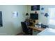 Functional home office space with a desk setup, ample lighting, and modern decor at 1213 N Raven --, Mesa, AZ 85207