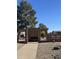 Community entrance with brick sign, desert landscaping, and seating bench providing a welcoming atmosphere at 13251 W Aleppo Dr, Sun City West, AZ 85375