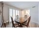 Cozy dining room featuring bright light and hardwood flooring, perfect for gatherings at 13251 W Aleppo Dr, Sun City West, AZ 85375