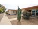 Charming home exterior with landscaped yard, desert plants and cozy curb appeal at 13251 W Aleppo Dr, Sun City West, AZ 85375