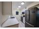 Functional kitchen with modern appliances, ample countertop space, and bright overhead lighting at 13251 W Aleppo Dr, Sun City West, AZ 85375