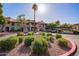 Condominium complex exterior with beautiful desert landscaping, covered parking, and well-maintained stucco at 1351 N Pleasant Dr # 2030, Chandler, AZ 85225