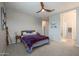 Bedroom featuring ceiling fan, carpet and neutral walls at 14870 W Encanto Blvd # 2069, Goodyear, AZ 85395