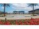 Goodyear Civic Square with decorative flower beds, lawn, and the city hall in the background at 14870 W Encanto Blvd # 2069, Goodyear, AZ 85395