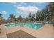 Community pool area showcasing the pool, comfortable seating, and well-maintained surroundings at 14870 W Encanto Blvd # 2069, Goodyear, AZ 85395