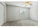 Bedroom with neutral walls, carpet, and window at 14970 N 172Nd Dr, Surprise, AZ 85388