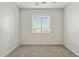 Bedroom with window and neutral walls at 14970 N 172Nd Dr, Surprise, AZ 85388