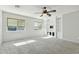 Spacious bedroom featuring built-in shelving and light-filled windows at 14970 N 172Nd Dr, Surprise, AZ 85388