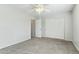 Bedroom featuring a ceiling fan and double door closet at 14970 N 172Nd Dr, Surprise, AZ 85388