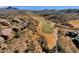 Gorgeous aerial shot of homes beside a golf course, showcasing desert landscape at 16210 E Links Dr, Fountain Hills, AZ 85268