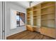 Bedroom featuring built-in shelving and a ceiling fan at 16210 E Links Dr, Fountain Hills, AZ 85268