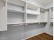 Spacious walk-in closet with custom shelving and plenty of storage at 16210 E Links Dr, Fountain Hills, AZ 85268