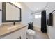 Bathroom features tile flooring and shower with modern fixtures at 1709 W Clarendon Ave, Phoenix, AZ 85015