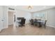 Dining room featuring an adjacent home office space, tile flooring, and plenty of natural light at 1709 W Clarendon Ave, Phoenix, AZ 85015